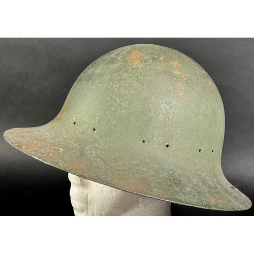 639 - WWII period military interest. A Zuckerman type steel helmet stamped M, lacks liner