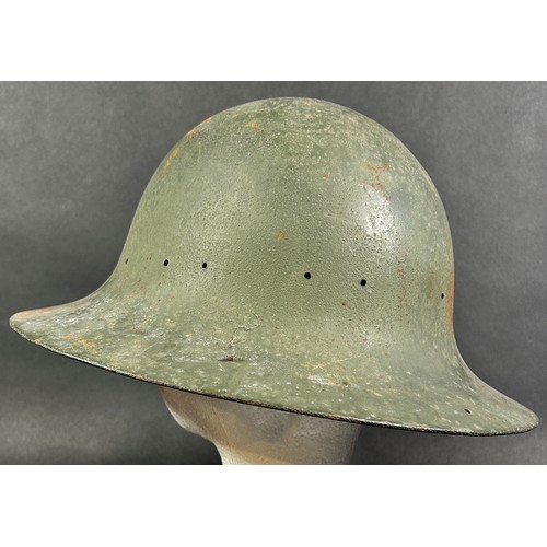 639 - WWII period military interest. A Zuckerman type steel helmet stamped M, lacks liner