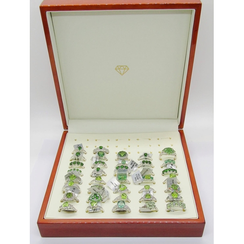 426 - Collection of green gem set silver dress rings, to include peridot, flourite, apatite, topaz, green ... 