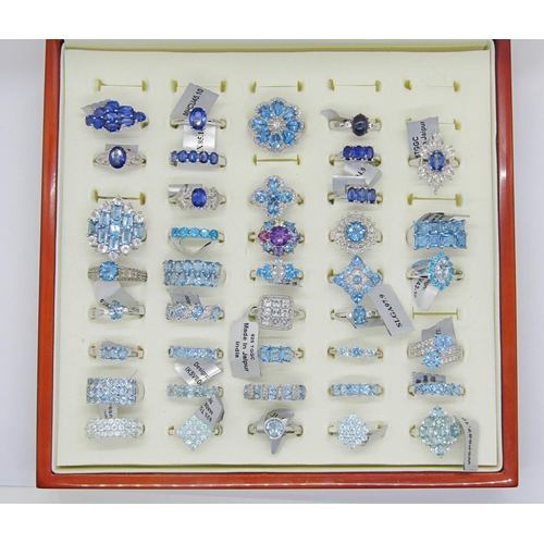 429 - Collection of blue - turquoise coloured gem set silver dress rings, to include kyanite, star sapphir... 