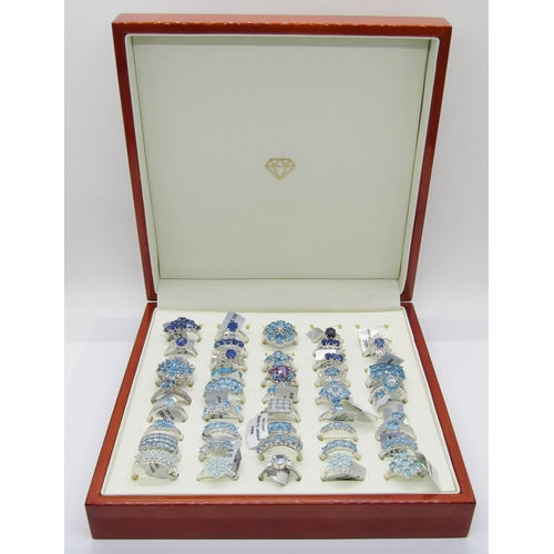 429 - Collection of blue - turquoise coloured gem set silver dress rings, to include kyanite, star sapphir... 