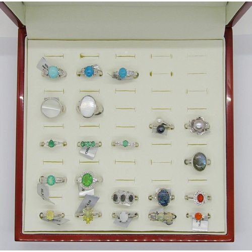 431 - Collection of gem set silver dress rings, to include several opal examples, fire opal, pearl, labrad... 