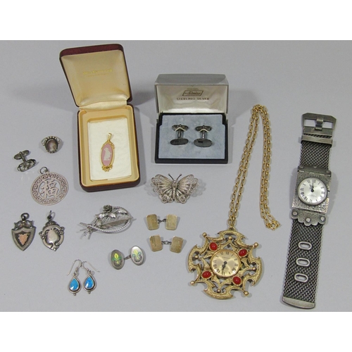 434 - Collection of silver and costume jewellery to include two silver medal fobs, a Bond Boyd silver rose... 