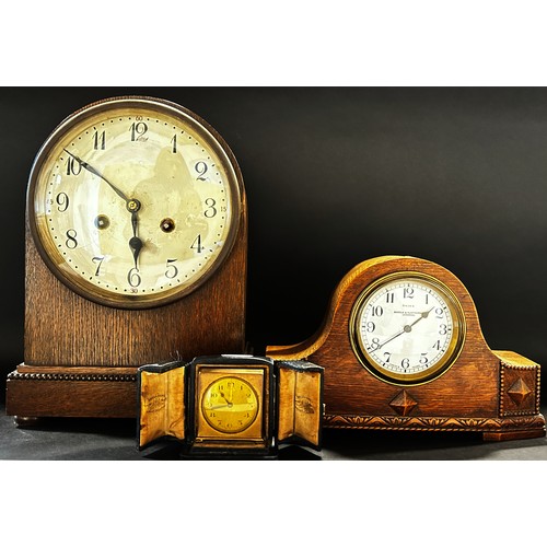 509 - Oak mantle clock with two train striking movement, further example with carved and shaped oak case w... 