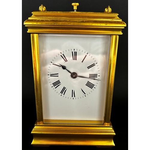 514 - Good quality contemporary brass carriage clock with enamelled dial, eight day movement and strike an... 