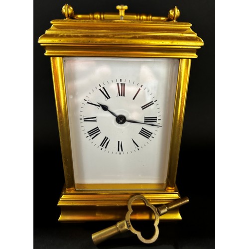 514 - Good quality contemporary brass carriage clock with enamelled dial, eight day movement and strike an... 