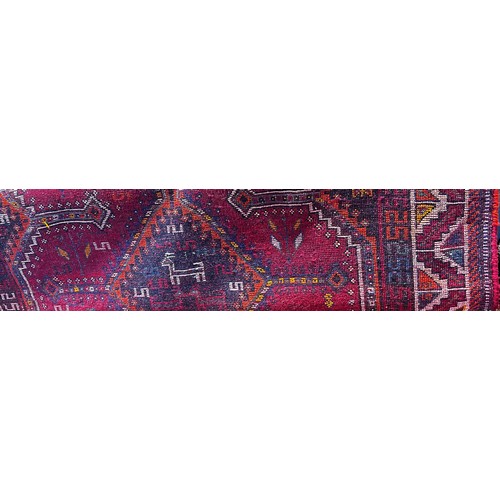 1561 - South West Persian Lori carpet with a red and gold geometric pattern, 2.55m x 1.68m approx