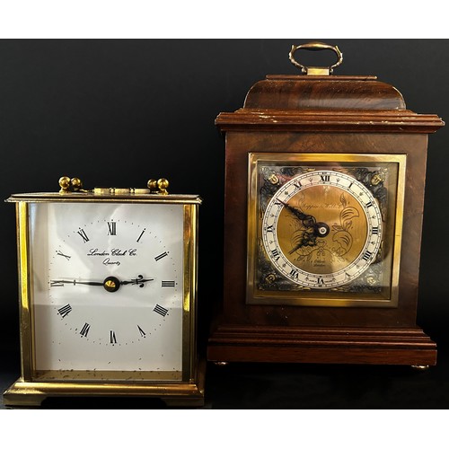 516 - Small figured walnut mantle clock in the form of a Georgian bracket clock by Elliott of London retai... 