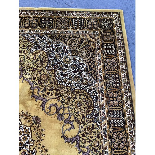 1590 - Large Persian Wilton style machine made rug with central medallion and scrolling flora and fauna dec... 