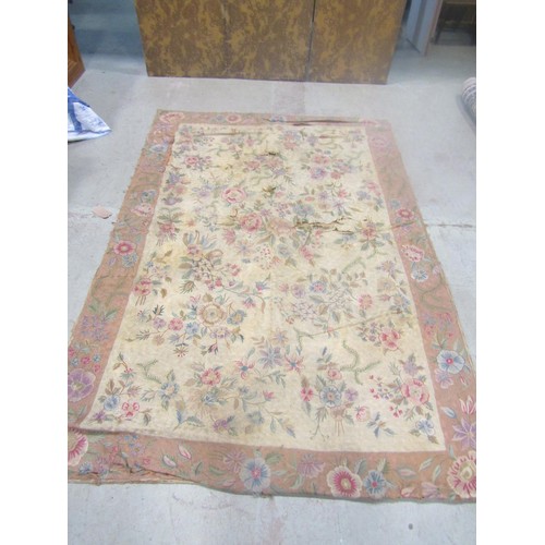 1564 - A 19th century Kashmiri hand stitched carpet with an all over floral pattern (as found with holes an... 