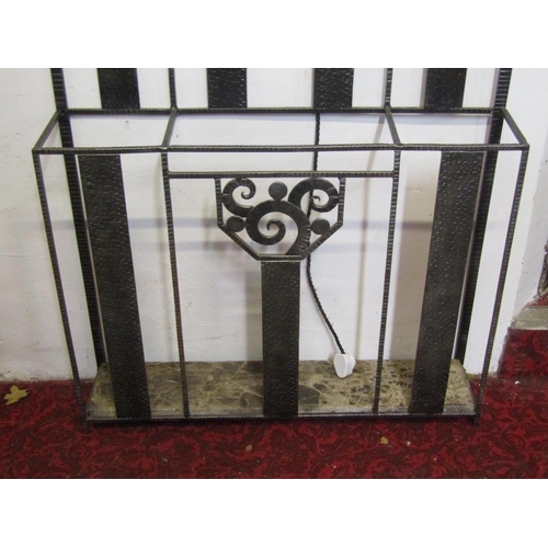 1058 - Manner of Edgar Brant - an Art Deco style metal framed hallstand, the open vertical slatted frame wi... 