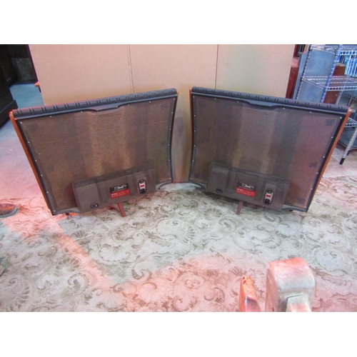 1102 - A pair of vintage Quad floor standing electrostatic  speakers of curved form raised on square tapere... 