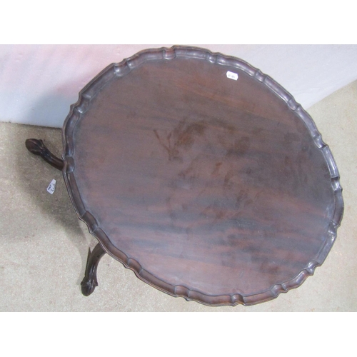 1157 - A good quality Georgian style mahogany snap top occasional  table of oval form with pie crust border... 