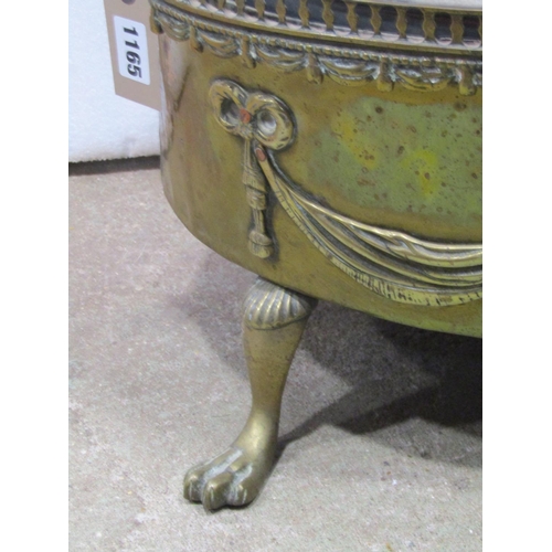 1165 - An oval brass planter with classical tied ribbon, swag and mask detail, removable liner and swept pa... 