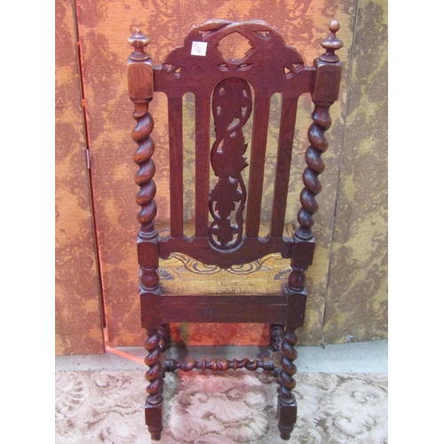 1255 - A Chippendale style open elbow chair with pierced splat and drop in floral tapestry seat together wi... 