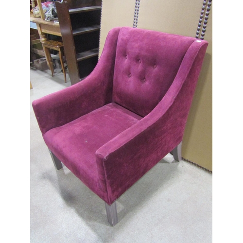 1276 - A Georgian style upholstered easy chair with down swept arms and simple button back, raised on paint... 