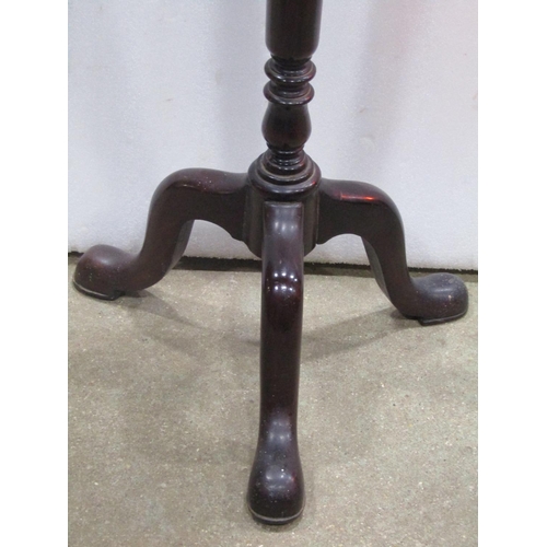 1288 - A Georgians tyle mahogany torchere with circular tray top raised on a simple turned column and shape... 