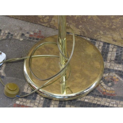 1307 - A contemporary polished brass effect floorstanding standard/reading light with tubular stem and dish... 