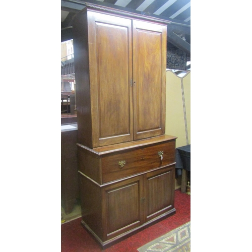 1312 - A Georgian mahogany secretaire with brass button press release fall front, enclosing a pigeon hole a... 