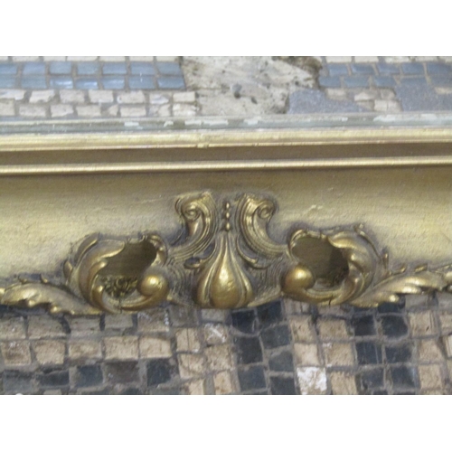 1320 - A swept stepped and moulded rectangular gilt framed wall mirror with scrolling acanthus detail, 69 c... 