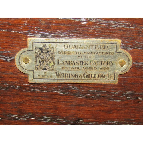 1390 - A Waring & Gillow Ltd Edwardian Jacobean style oak dresser base, the two central drawers flanked by ... 