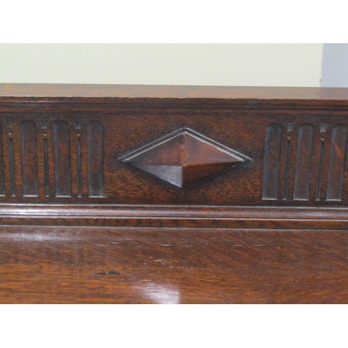 1390 - A Waring & Gillow Ltd Edwardian Jacobean style oak dresser base, the two central drawers flanked by ... 