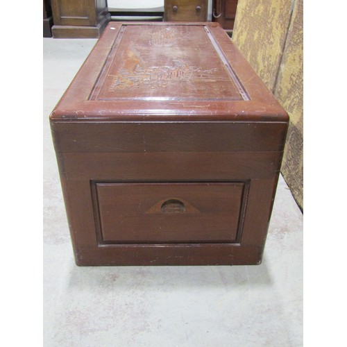 1133 - A camphor wood coffer with hinged lid and carved detail, 40 cm high x 94 cm wide x 46 cm deep