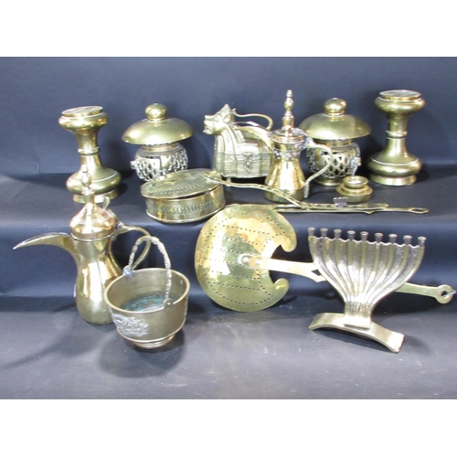 541 - A mixed selection of brass ware, including Middle Eastern coffee pots on stands, incense burners, a ... 