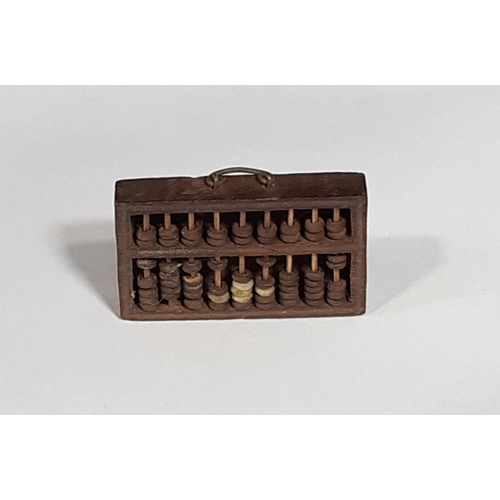 452 - A collection of vintage pen knives, Victorian medallions, tiny wooden abacus and cabinet items