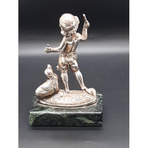 463 - Silver plated model of a child with a seal, marble box