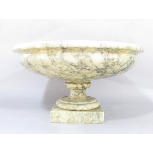 621 - A mottled green alabaster tazza, 30cm diam, raised on a square base.