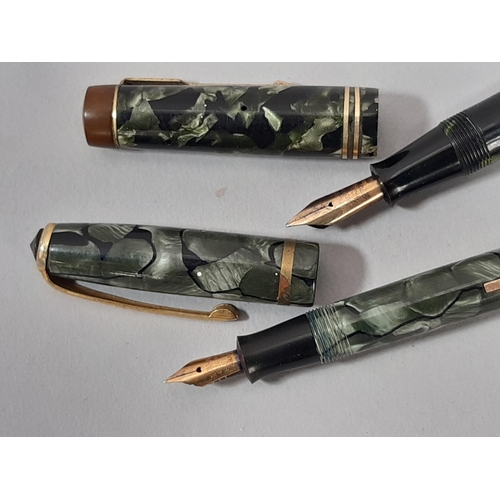 460 - Two vintage fountain pens; a Stephens Leverfil no 270 with 14ct nib together with a Burnham no 51 fo... 