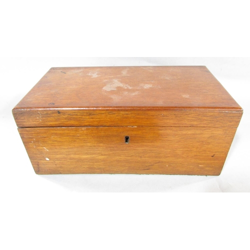 624 - An Edwardian oak desk top stationery box with a fitted interior, together with two mahogany boxes.