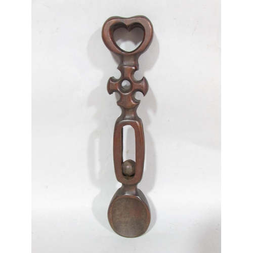 628 - Four Welsh love spoons, intricately carved.