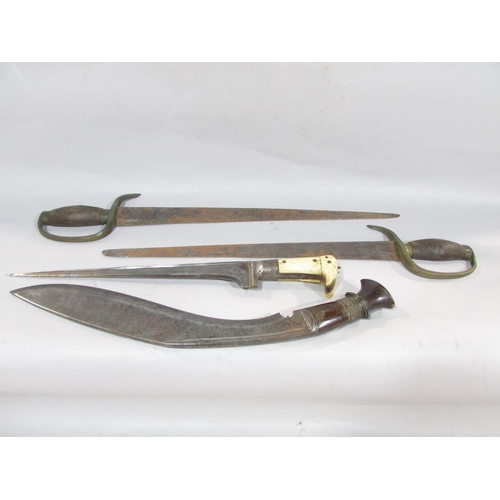 635 - A South East Asian long bladed dagger with a bone handle, 42cm long, a pair of flat handled knives w... 