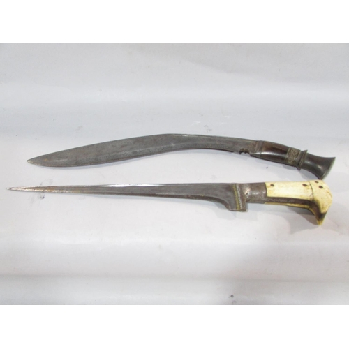 635 - A South East Asian long bladed dagger with a bone handle, 42cm long, a pair of flat handled knives w... 