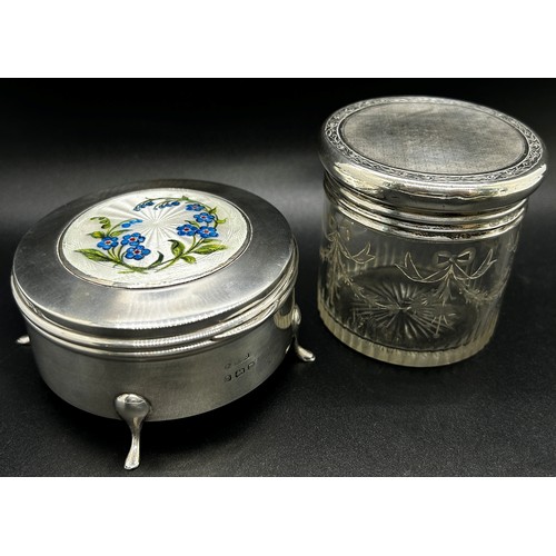 304 - An early 20th century silver trinket box with a floral enamelled lid Birmingham 1911, together with ... 