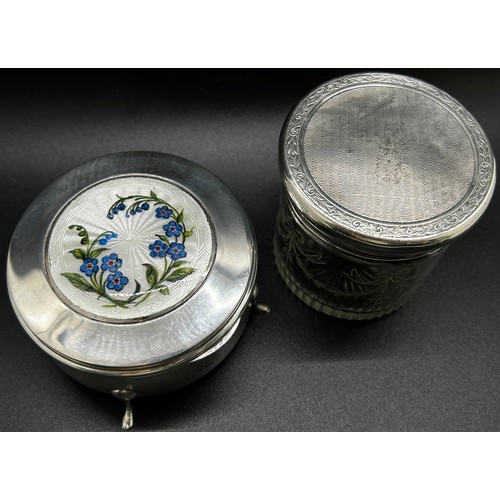 304 - An early 20th century silver trinket box with a floral enamelled lid Birmingham 1911, together with ... 