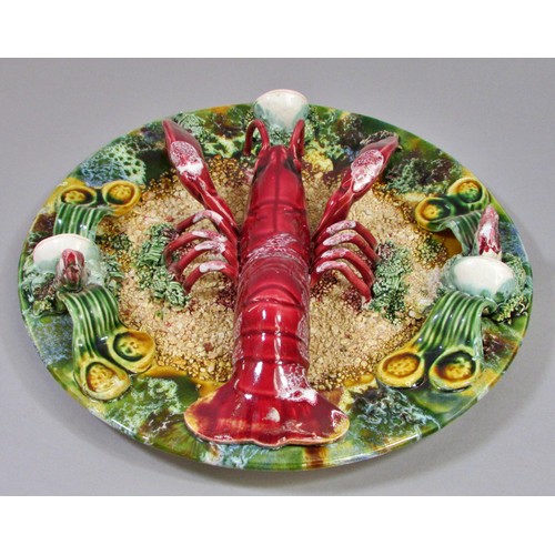 149 - Curious collection of ceramic crustaceans to include Crabs and Lobsters, shells, etc, mainly in the ... 