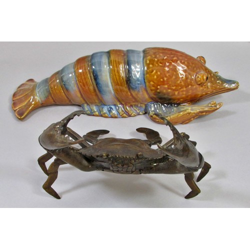 149 - Curious collection of ceramic crustaceans to include Crabs and Lobsters, shells, etc, mainly in the ... 