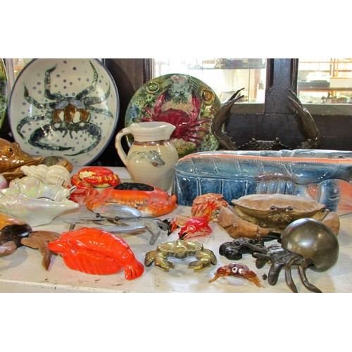 149 - Curious collection of ceramic crustaceans to include Crabs and Lobsters, shells, etc, mainly in the ... 