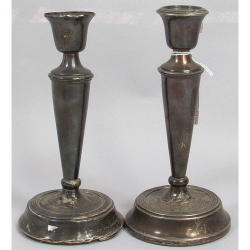 239 - A pair of silver candlesticks (af) and a selection of silver flatware, 12 ozs approximately