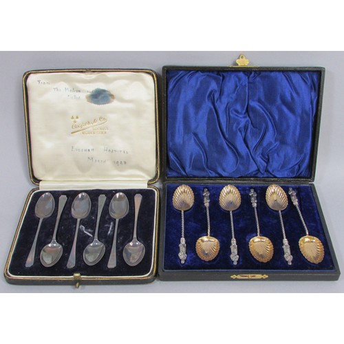 241 - A cased sex of 6 silver teaspoons, a cased set of 6 apostle spoons, 7 napkin rings, sugar nips and a... 