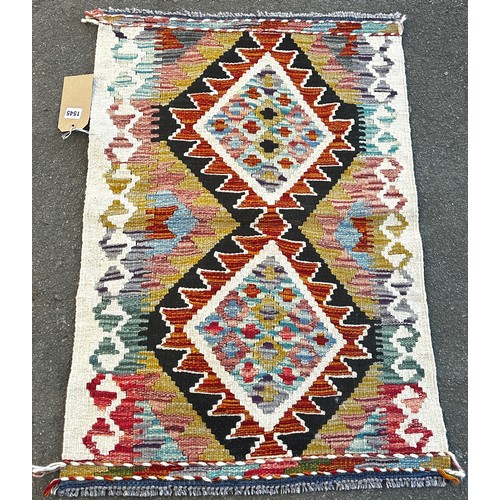 1545 - A Chobi kilim, mat with a multicoloured diamond pattern, 87 x 60cm