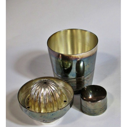 255 - A silver French beaker, bearing the head of Minerva, two napkin rings, a clawed sugar tong, three as... 