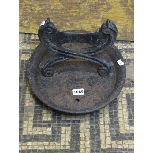 1088 - A cast iron boot scraper with oval tray base together with a companion set (2)