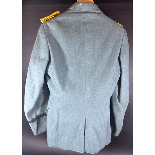 531 - German Third Reich Military interest. An original German military tunic with a miscellaneous selecti... 