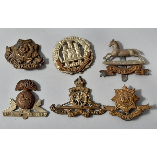 472 - Approx 20 military regimental cap badges, naval buttons and braid