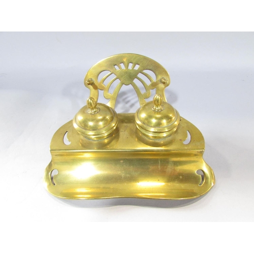 538A - A brass ship’s engine room Telegraph set on a circular wood base, still in working, 53cm tall togeth... 