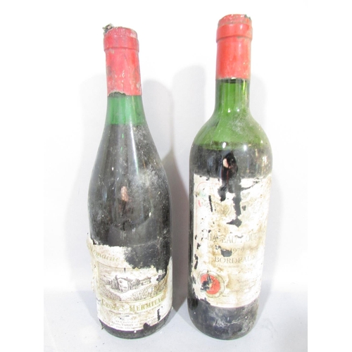 542A - Eight bottles of vintage red wine, indistinguishable distressed labels, one bottle of 1985 Bouchard ... 